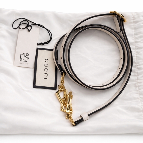 Gucci Handbags - Gucci Black and White Leather Purse Strap with Gold Accents